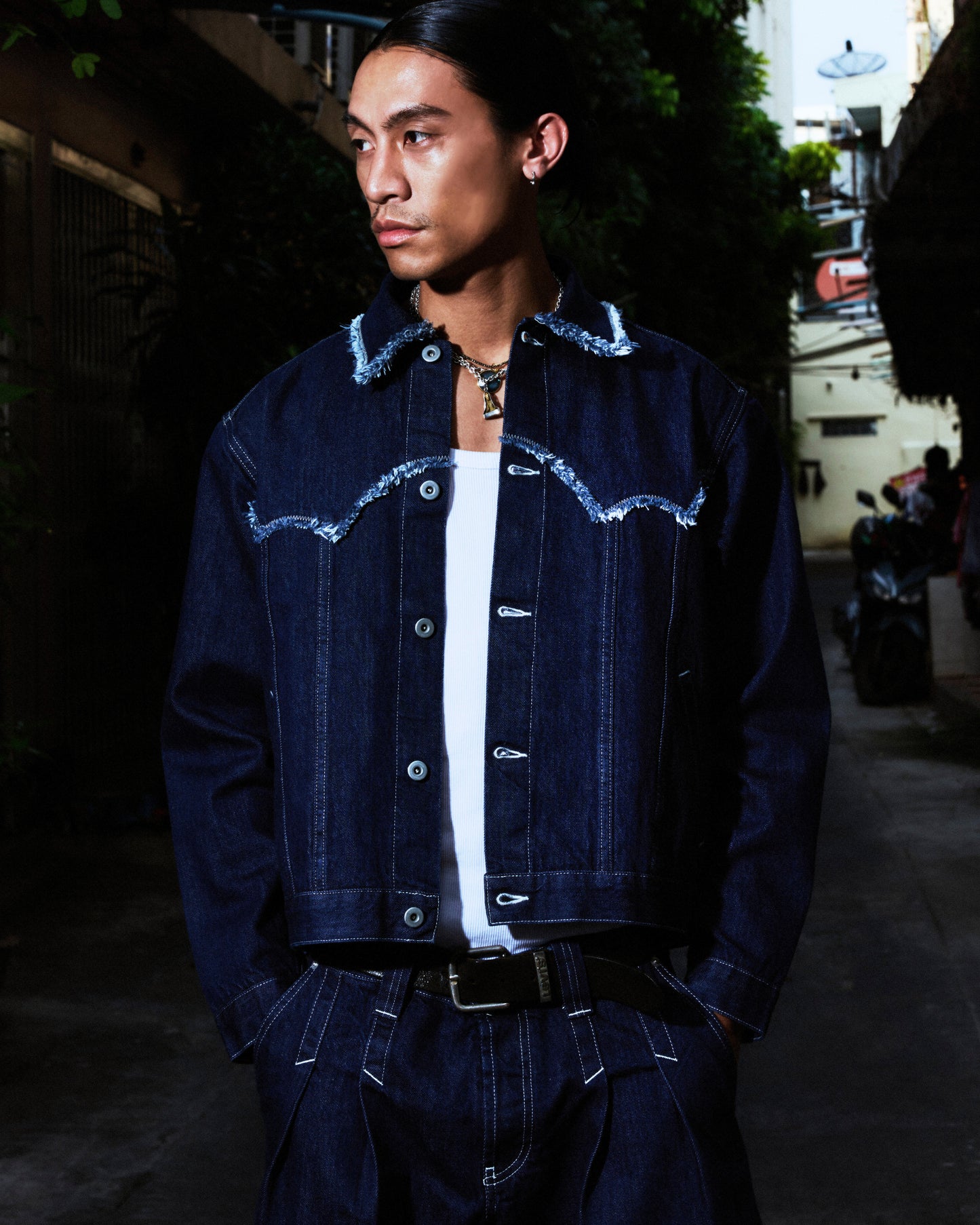 QLOUDLIGHT Balloon Jacket detail shot — frayed edges, Japanese buttons, made in Pantin